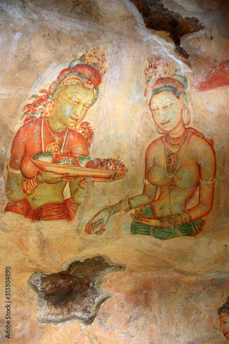 The Sigiriya Cloud Maidens, frescos from the 5th century AD, at the well known Lion Rock in Sigiriya in Central Province of Sri Lanka