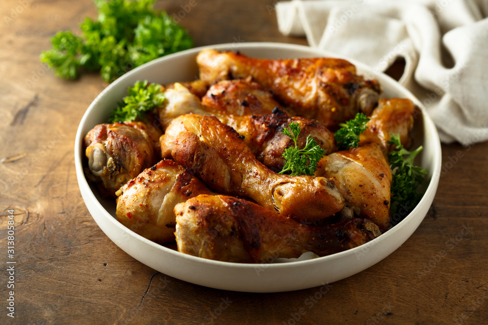 Roasted chicken drumsticks with fresh parsley Roasted chicken drumsticks with fresh parsley