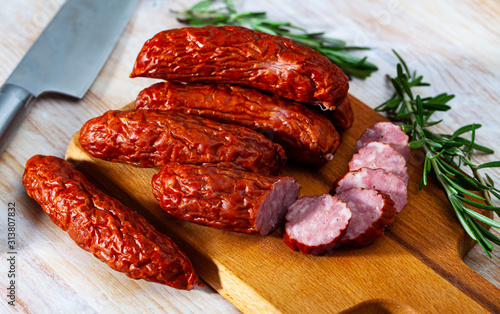  Czech dried sausages on wooden table