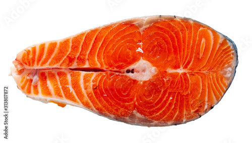 Raw salmon fillet on wooden table