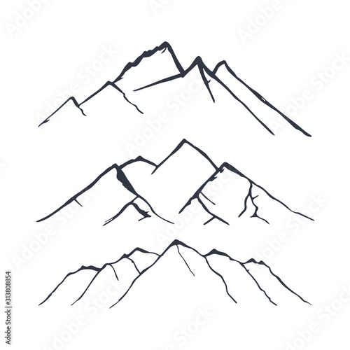 Mountains set. Hand drawn rocky peaks. Vector