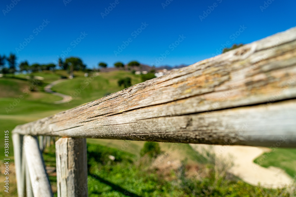 Golf at La Cala de Mijas, Spain on a sunny day with green grass and beautiful landscape.