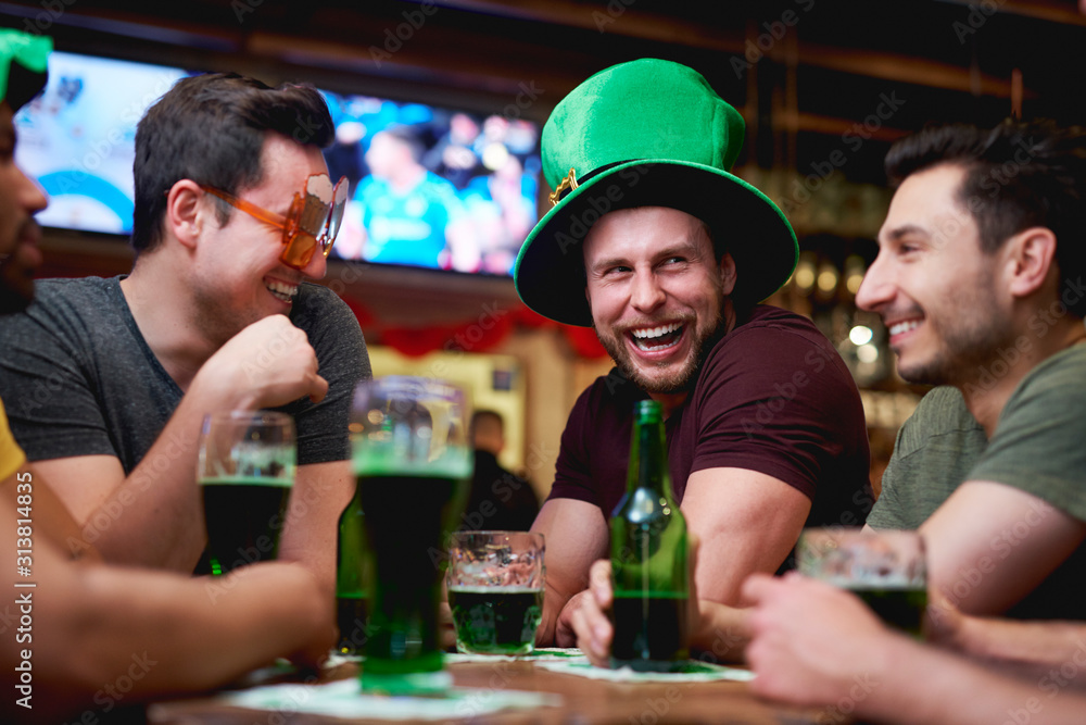 Group of men enjoying time together in the pub