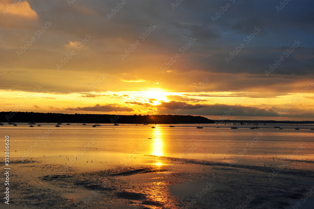 Poole harbour sunset near Brownsea island, Dorset, England