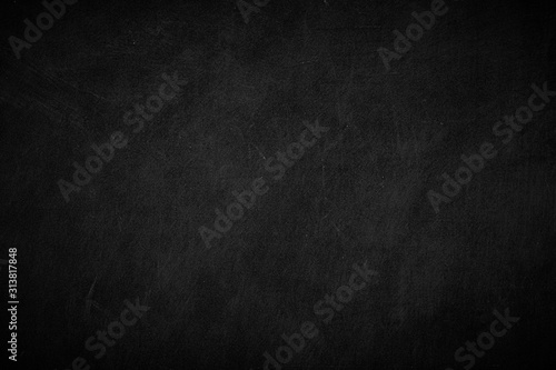 Blank front Real black chalkboard background texture in college concept for back to school kid wallpaper for create white chalk text draw graphic. Empty old back wall education blackboard.