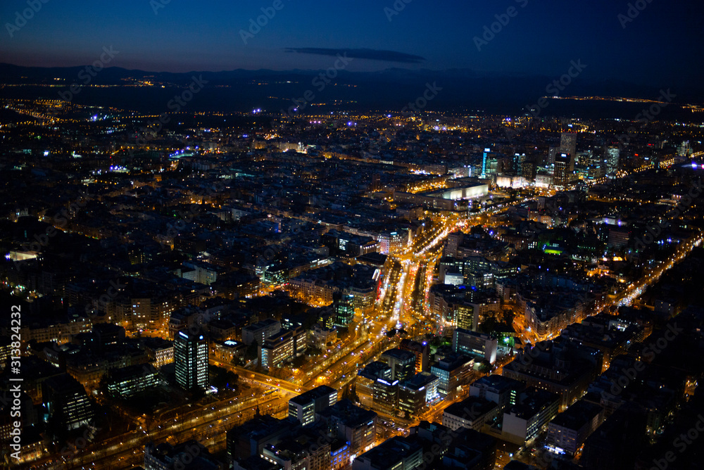 Panoramic aerial view of Madrid at night, Metropolis Building lights, capital of Spain, Europe