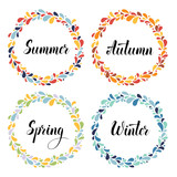set of circle color wreaths frame with four calligraphic  seasons names vector illustration isolated on white