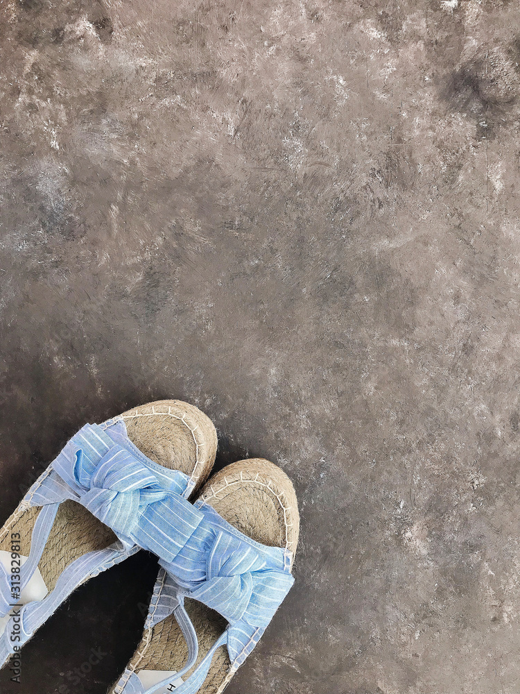 espadrilles shoes. photo background for cover. beach shoes on a textural