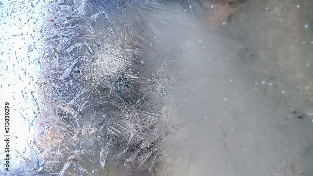 huge ice crystals on glass surface