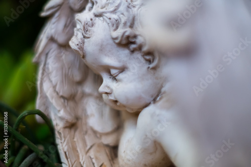 Sleeping angel statue close up