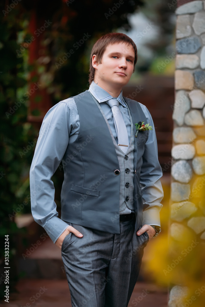 Groom in a gray suit