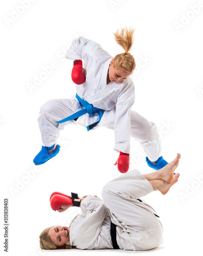 Two girls in sportswear training fight