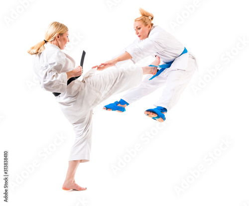 Cute blonde girls training karate