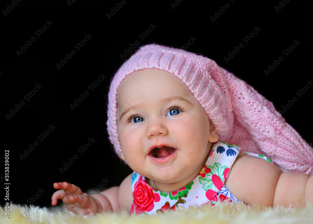 Cute smiling happy baby in the bedroom. Cute smiling happy baby in the bedroom.