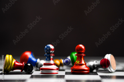 Print screen of flag on pawn chess of USA and China among others countries with black background.It is symbol of tariff trade war tax barrier between United States of America and China.-Image.