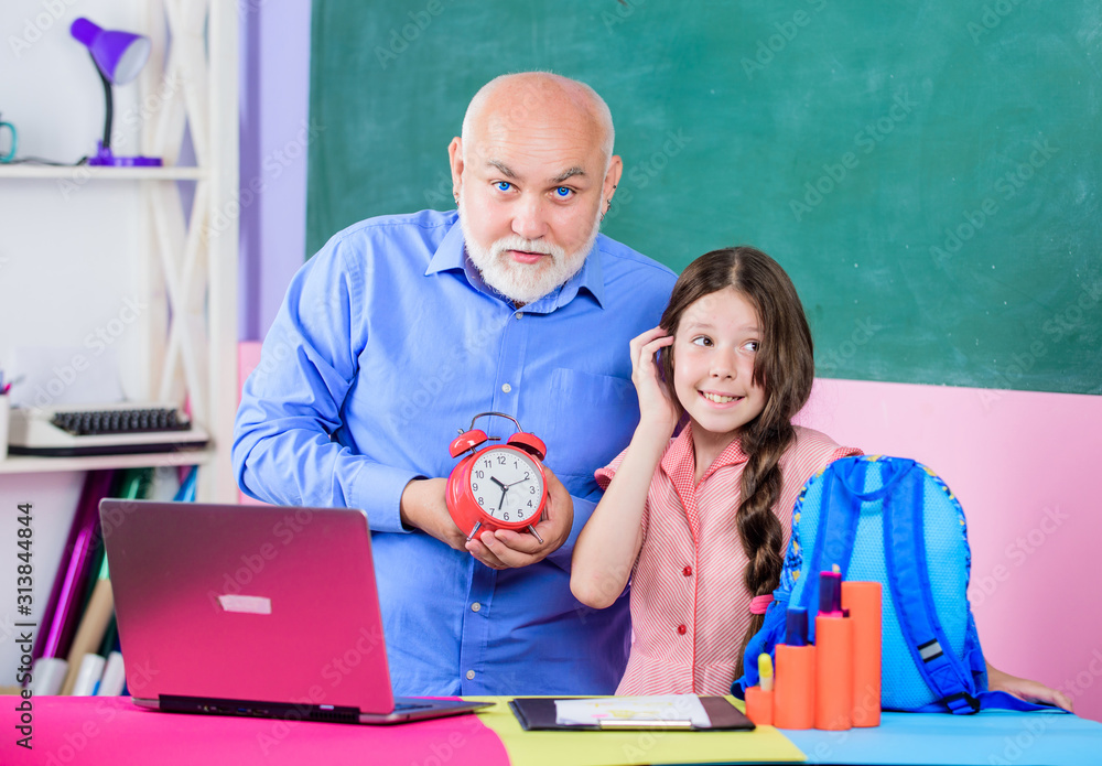 Little girl man tutor study. Time to study. Beginning of lesson. Study online lesson. Pedagogue friendly kind. Punctual pedagogue. Back to school. Teacher help schoolgirl. Study digital science Little girl man tutor study. Time to study. Beginning of lesson. Study online lesson. Pedagogue friendly kind. Punctual pedagogue. Back to school. Teacher help schoolgirl. Study digital science