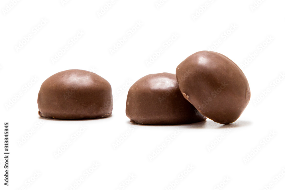 Chocolate candies with fillings isolated on a white background Chocolate candies with fillings isolated on a white background