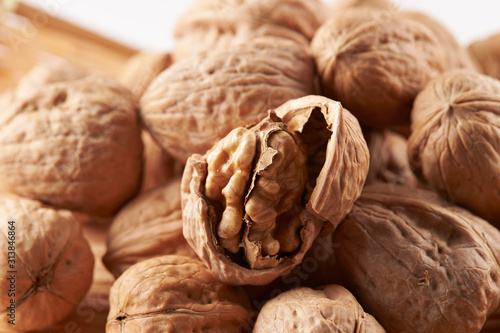 Fotografia Pile of walnuts on white background