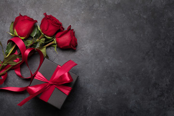 Valentines day card with gift box and rose flowers