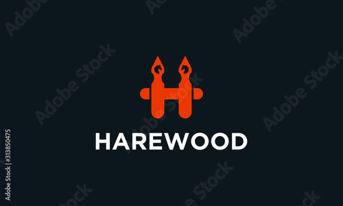 Modern minimal Harewood logo. This logo icon incorporate with wood border (look like letter H) and horse head in the creative way. photo