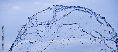 water splash isolated on blue background