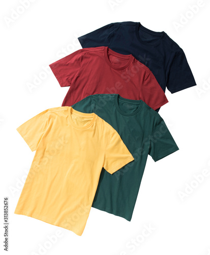 Colorful T-shirts folded group on background