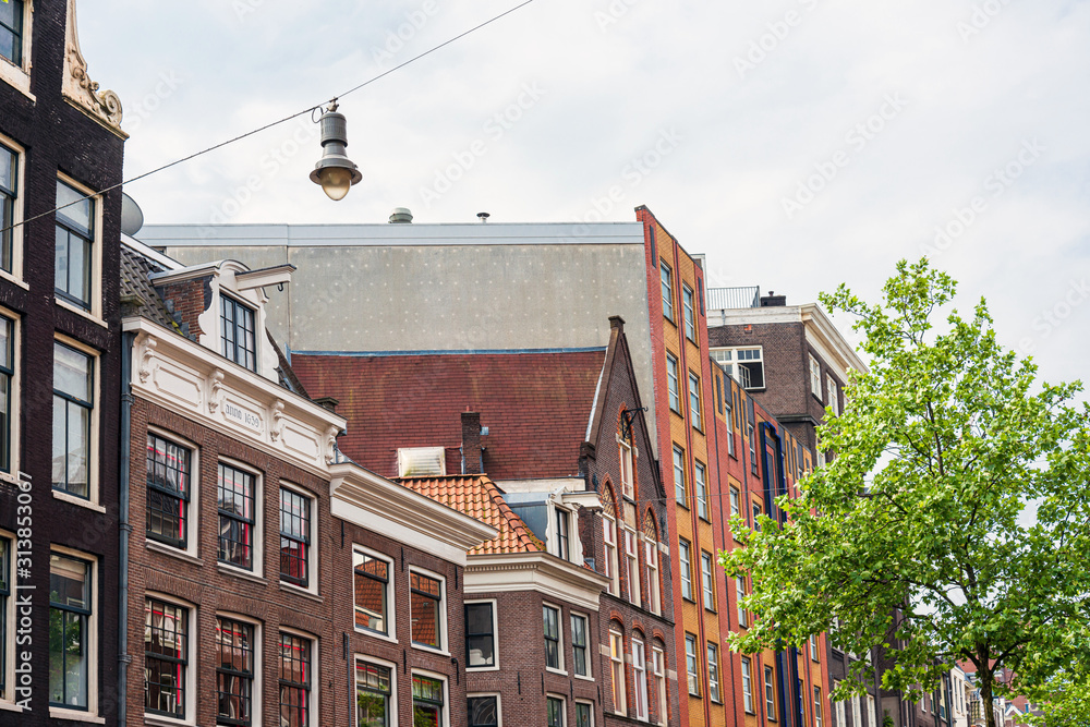 Amsterdam, Netherlands - May 23, 2018 : Beautiful street view of Traditional old buildings in Amsterdam,Netherlands