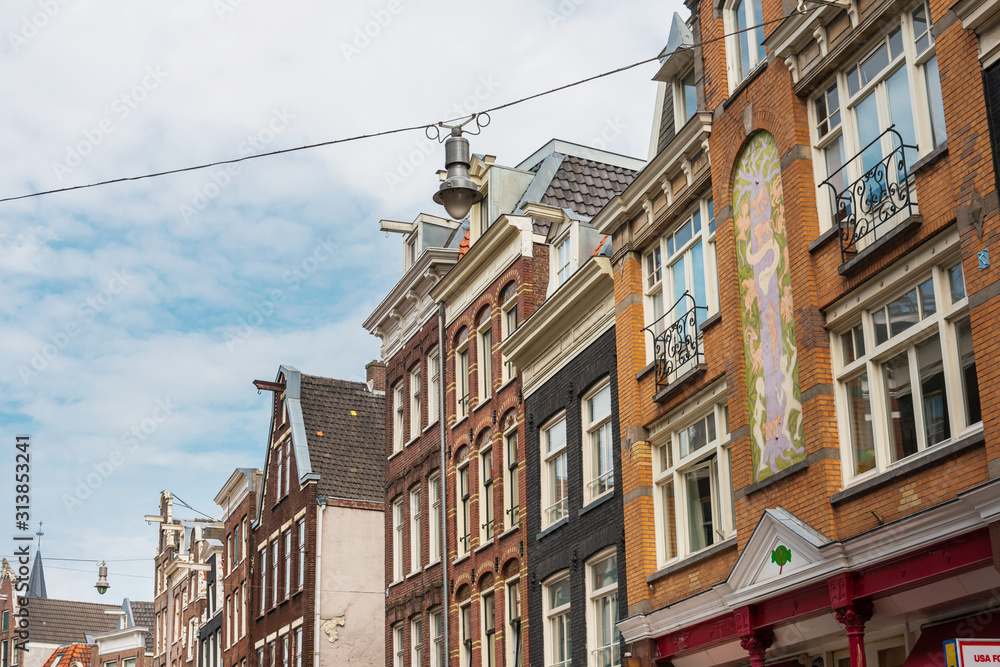 Amsterdam, Netherlands - May 23, 2018 : Beautiful street view of Traditional old buildings in Amsterdam,Netherlands