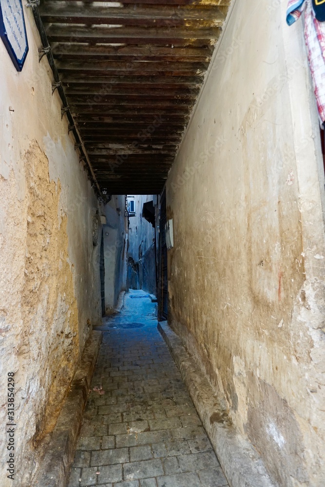 Fez, Morocco narrow street in medina