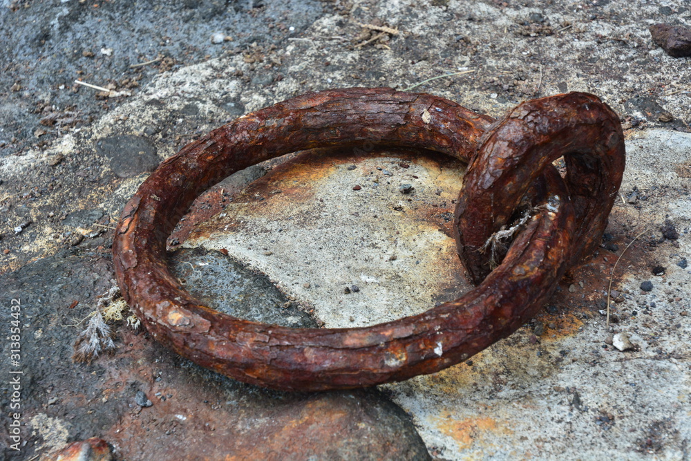 Rusty iron mooring ring Rusty iron mooring ring