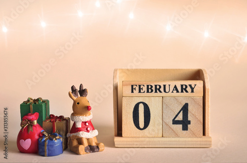 Februaru 4, Christmas, Birthday with number cube design for background. photo