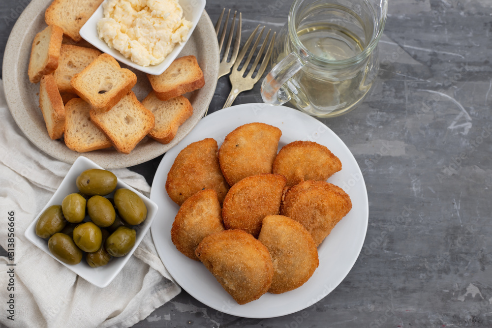 typical portuguese snack with meat rissois de carne on ceramic background typical portuguese snack with meat rissois de carne on ceramic background