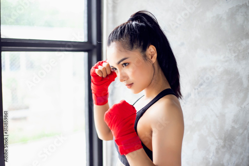Amateur Kickboxers Training On Heavy Bags stock photo