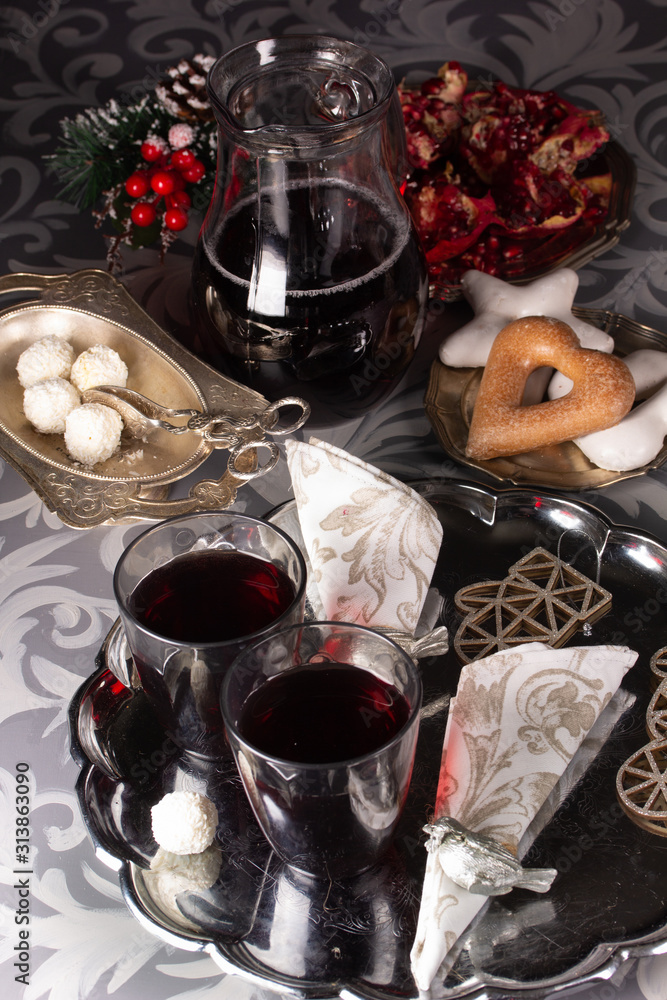 Pomegranate juice in glasses on a tray Pomegranate juice in glasses on a tray