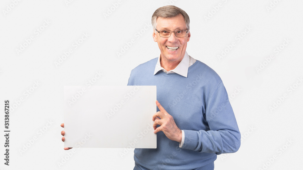 Smiling Senior Man Holding Blank Poster Standing, White Background, Panorama Smiling Senior Man Holding Blank Poster Standing, White Background, Panorama