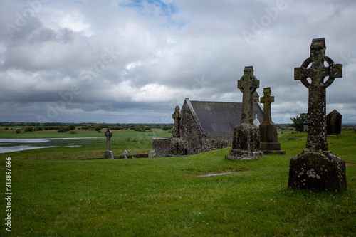 The monastery of Clonmacnoise ruin in Ireland photo