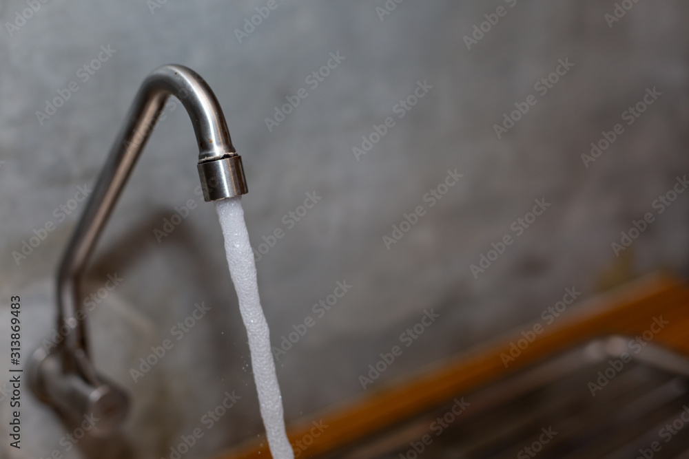 Water drop from faucet Water drop from faucet