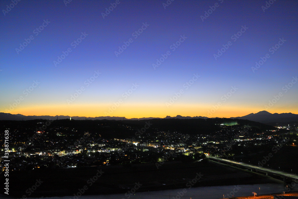 Aerial view of Takasaki city, Mount Myogi and Mount Asama in twilight, Gunma, Japan Aerial view of Takasaki city, Mount Myogi and Mount Asama in twilight, Gunma, Japan