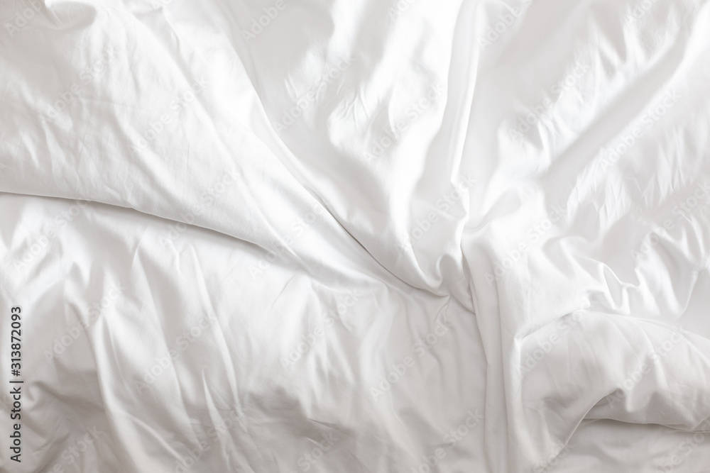 Wrinkled white blanket as a background Wrinkled white blanket as a background