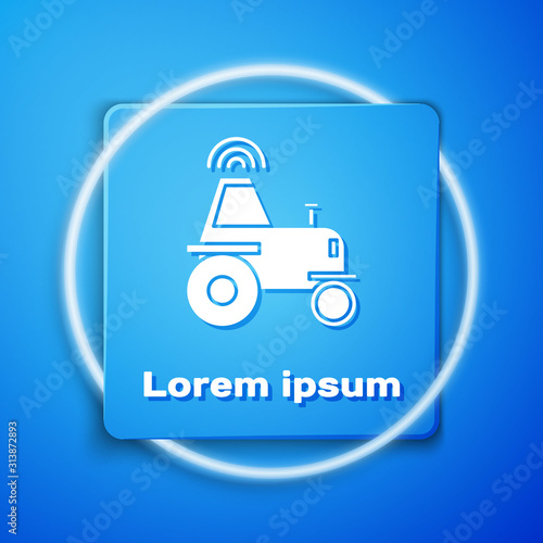 White Self driving wireless tractor on a smart farm icon isolated on blue background. Smart agriculture implement element. Blue square button. Vector Illustration