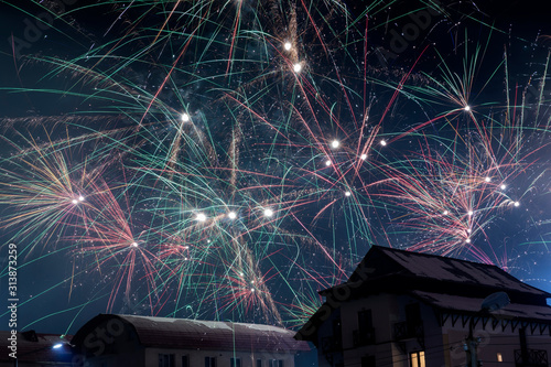 Fireworks over the snowy ro...