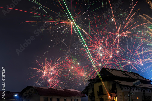 Fireworks over the snowy ro...