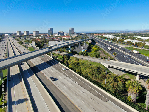 Aerial view of highway transportation with small traffic, highway interchange and junction, San Diego Freeway and Santa Ana Freeway. USU California