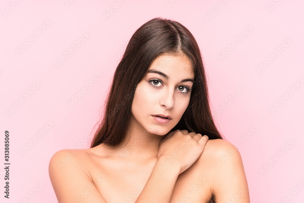Young beauty caucasian woman against a pink background Young beauty caucasian woman against a pink background