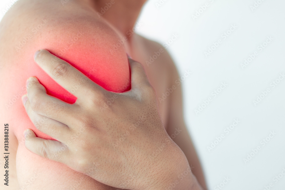 Man suffering from pain in shoulder,pain in the human body, closeup Man suffering from pain in shoulder,pain in the human body, closeup
