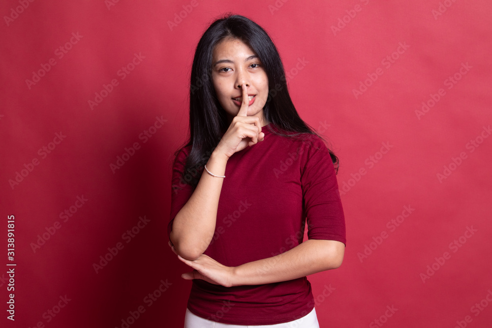 Asian girl smile show quite hand sign. Asian girl smile show quite hand sign.
