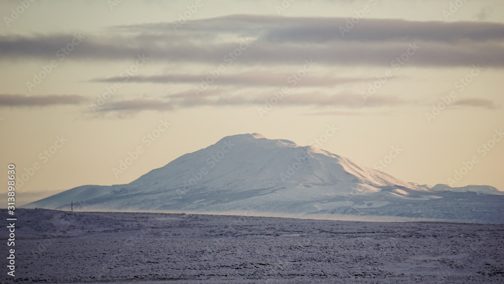 The infamous Hekla volcano covered in snow, South Iceland