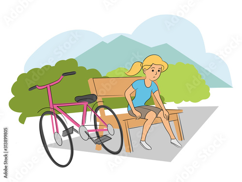 Girl cyclist with injured leg sitting on bench