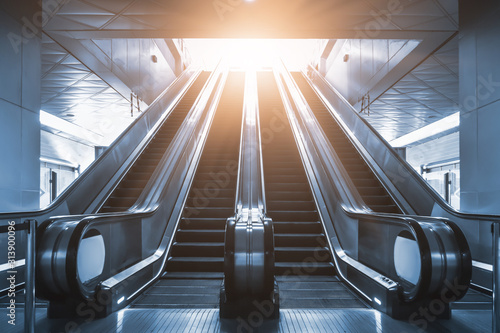 Mechanical escalator in the international airport or modern subway train station