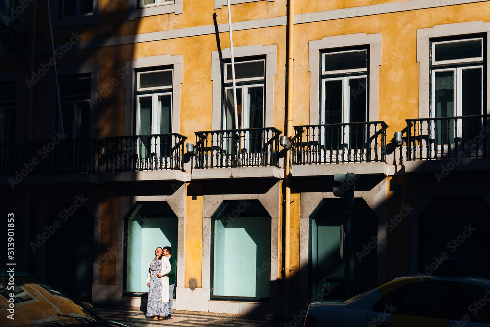 Lisbon, Portugal - Jan 27, 2018 a couple in love hugging the str